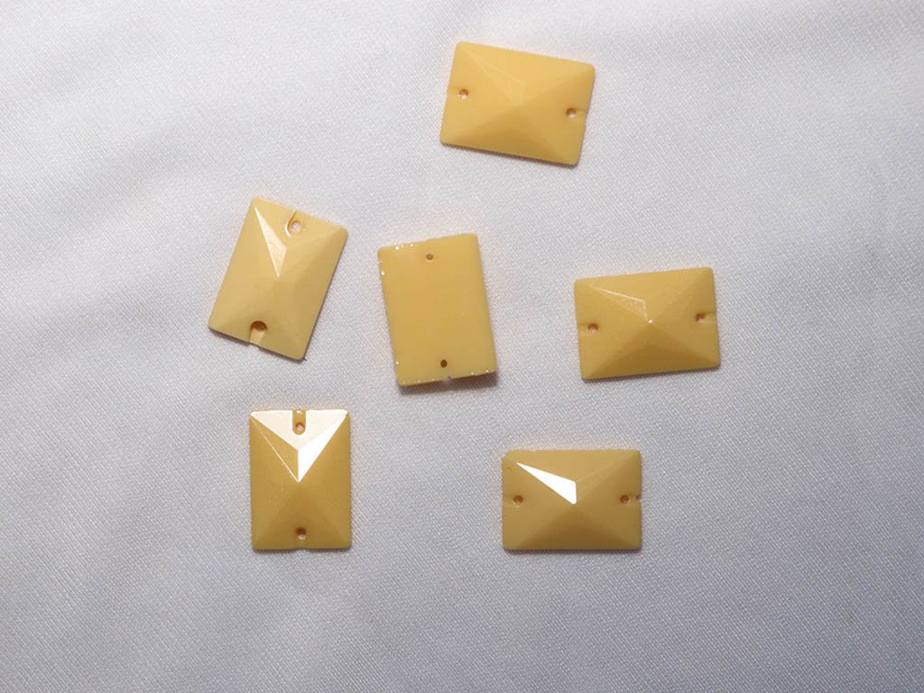yellow-2-hole-rectangular-dyeable-plastic-stones-25x18-mm