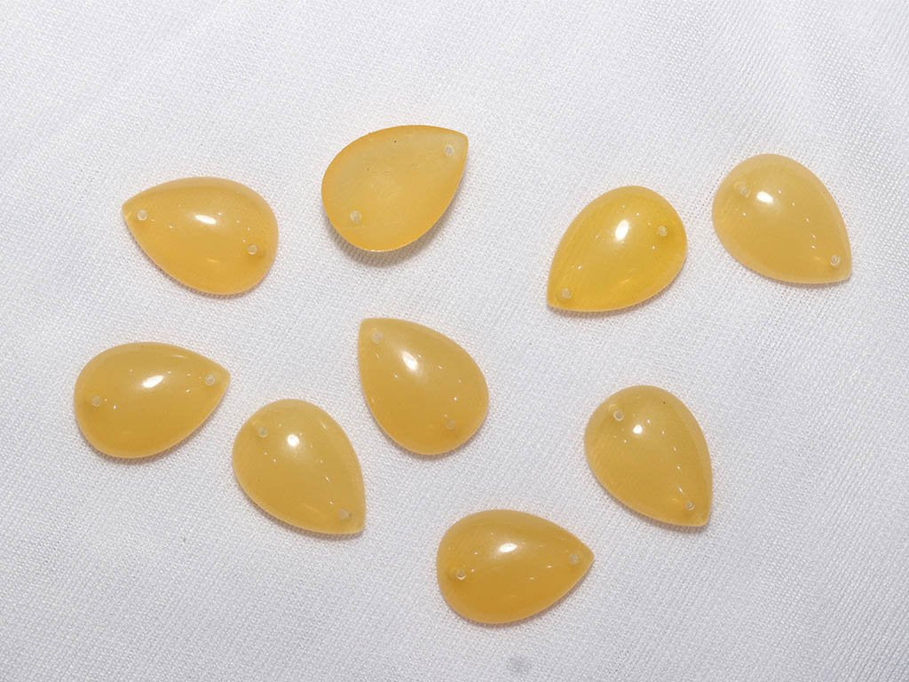 yellow-designer-drop-plastic-stones-18x13-mm-1