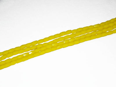 yellow-faceted-tube-crystal-beads