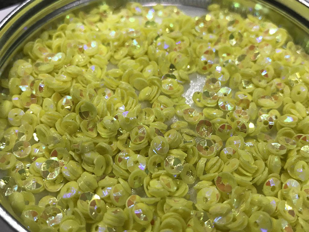 yellow-opaque-bowl-plastic-sequins