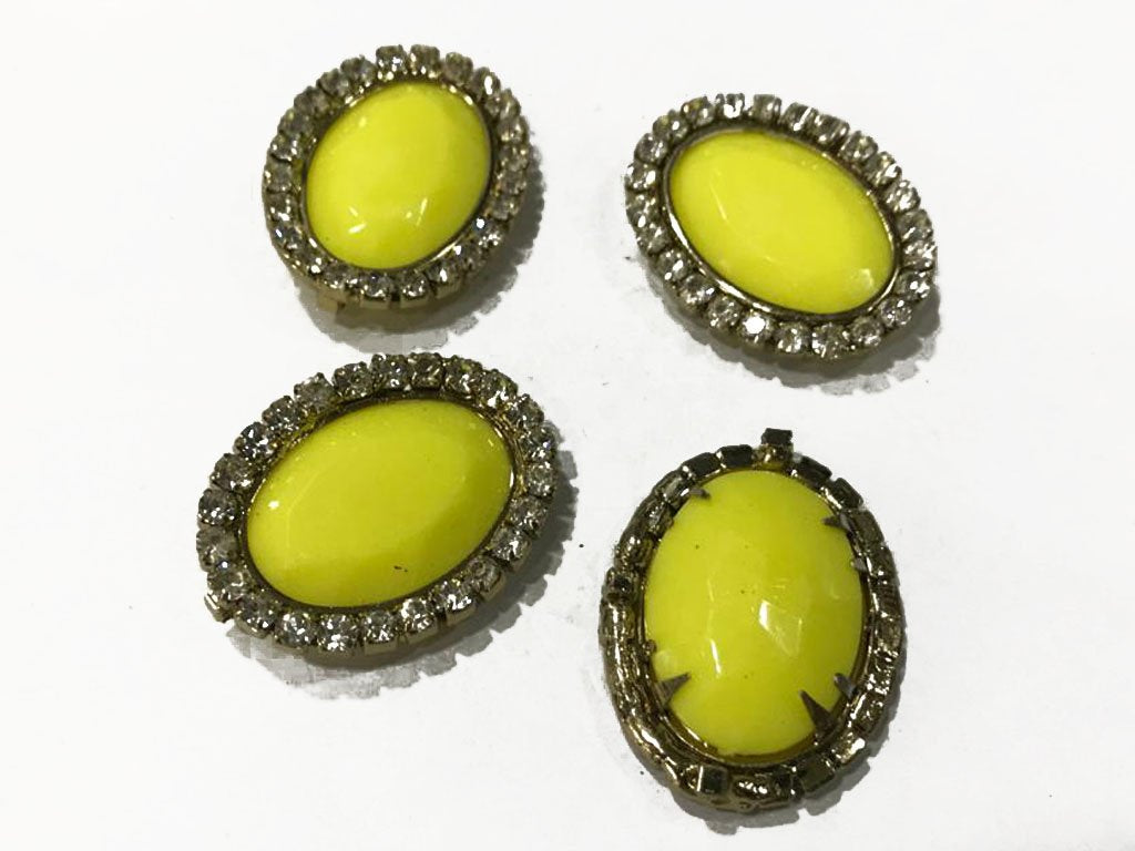 yellow-oval-plastic-stone-with-crystal-frame-28x30-mm