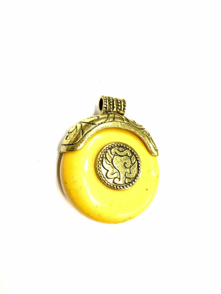yellow-pendant-with-golden-metal-cap