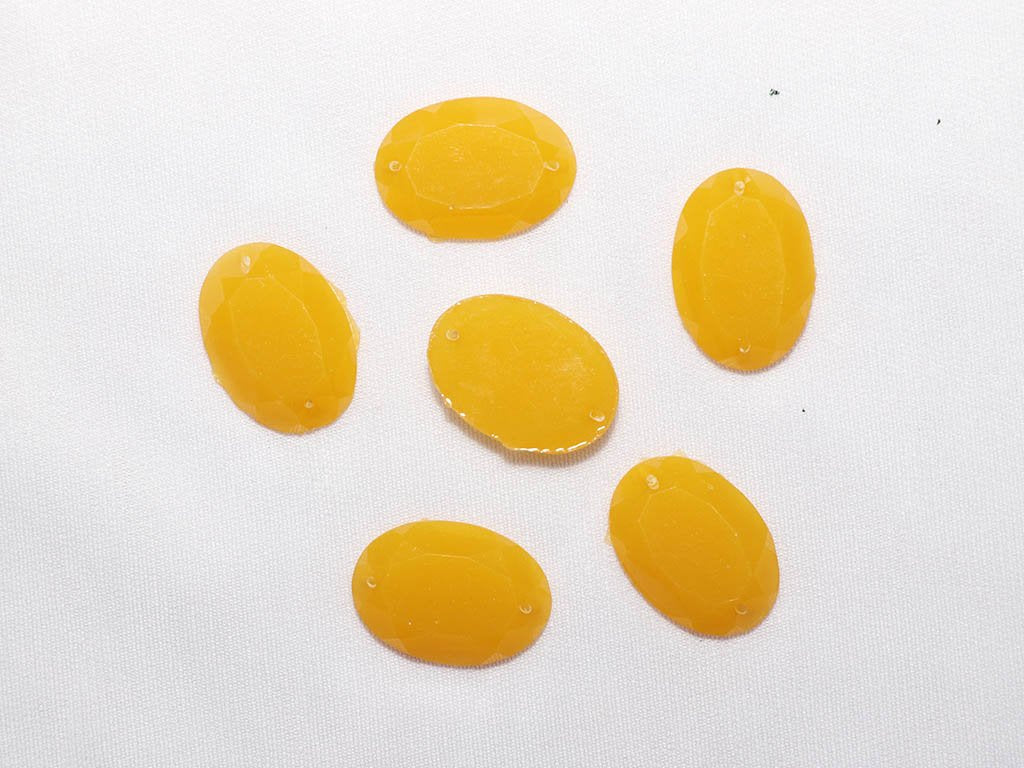 yellow-sparkle-designer-oval-plastic-stones-25x18-mm