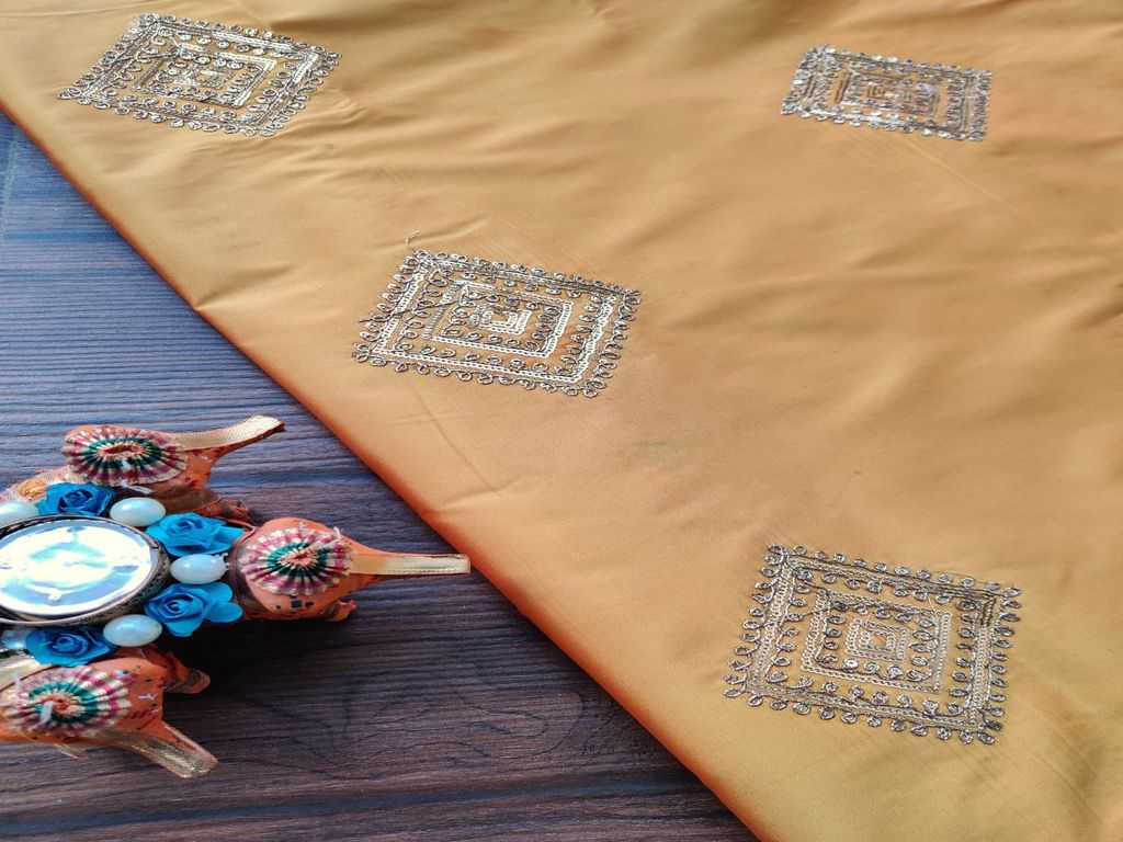 yellow-taffeta-silk-fabric-with-sequins-and-dori-embroidery-work-all-over