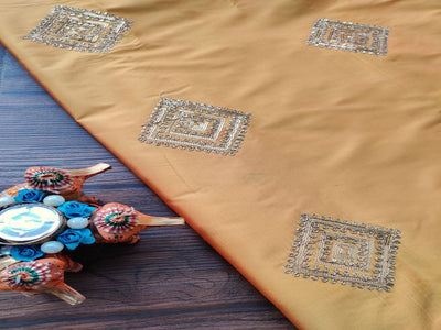 yellow-taffeta-silk-fabric-with-sequins-and-dori-embroidery-work-all-over