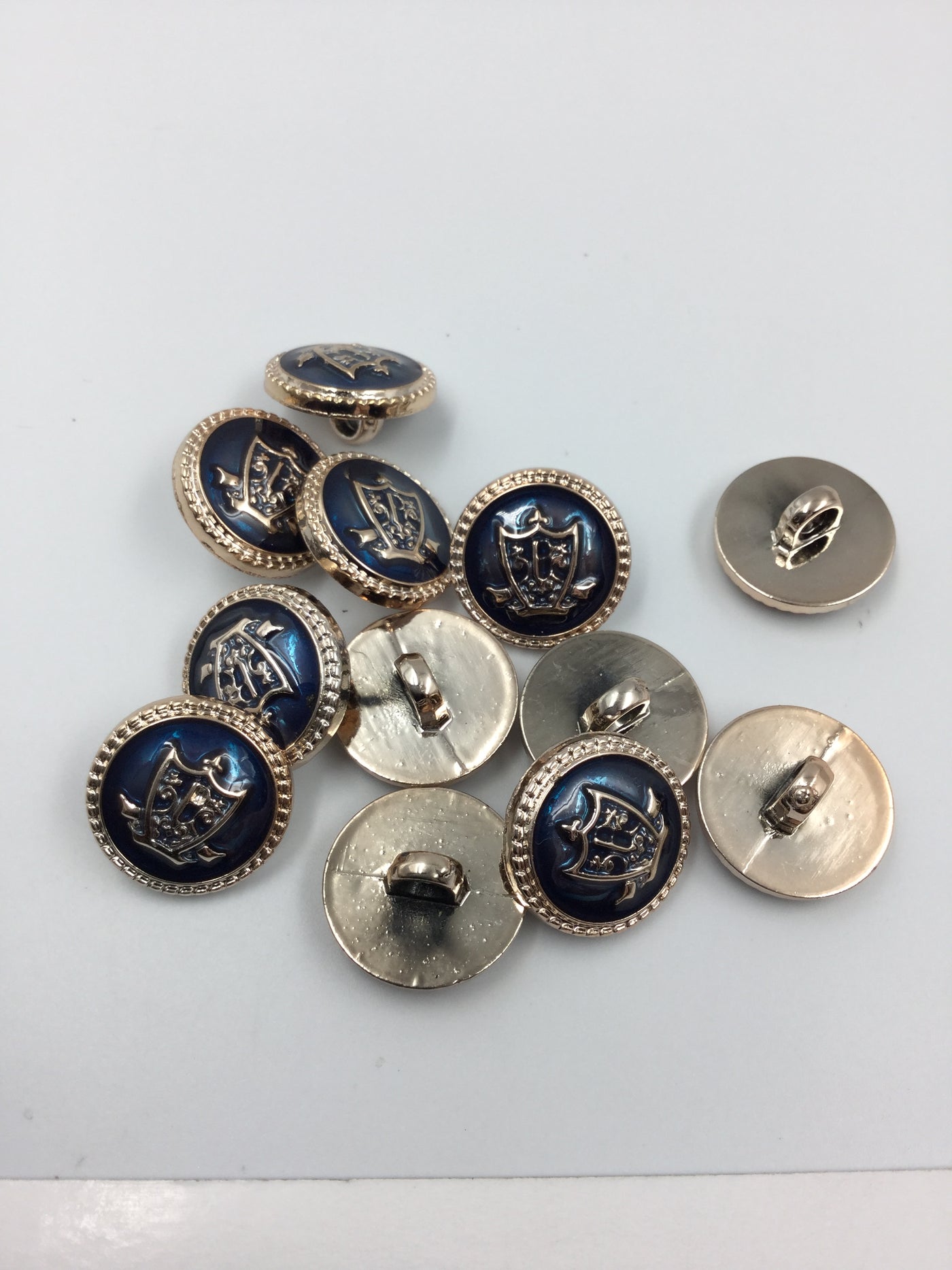 Blue Plastic Crest Design Buttons