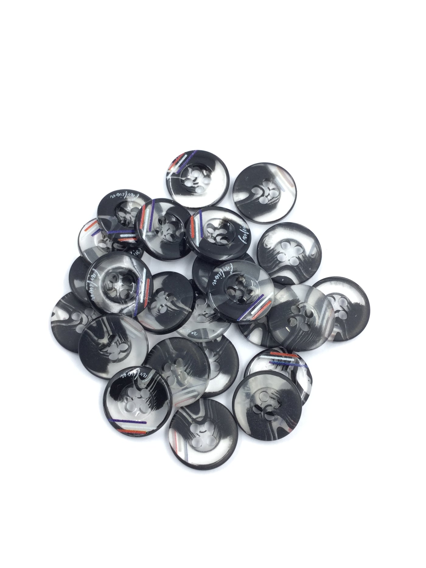 White and Black Circular Plastic Shirt Buttons