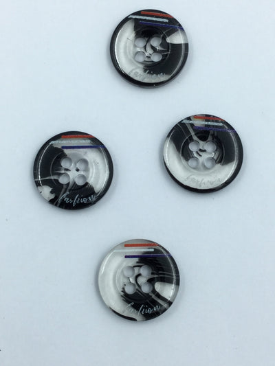 White and Black Circular Plastic Shirt Buttons