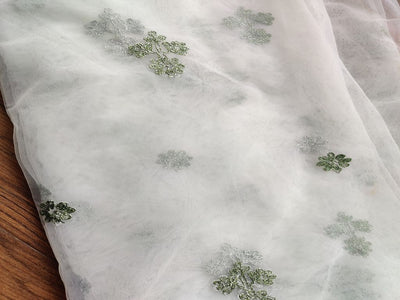 white-green-thread-flowers-embroidered-mono-net-fabric